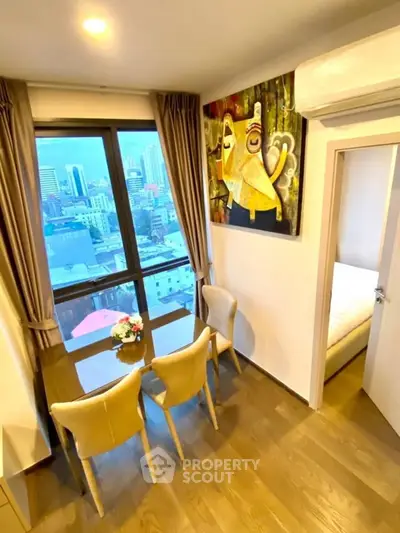 Stylish dining area with city view in modern apartment