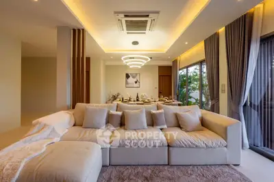 Luxurious modern living room with plush sofa and elegant lighting