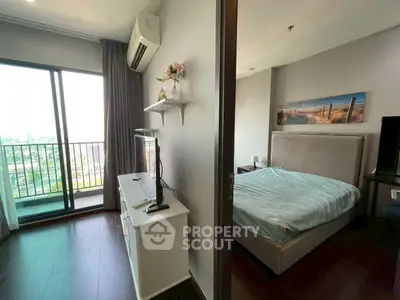 Modern bedroom with balcony view in stylish apartment