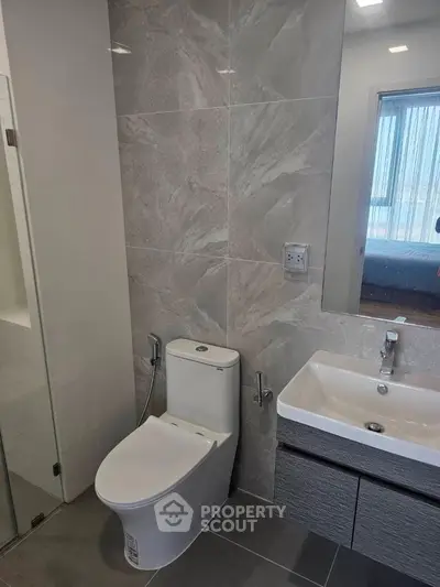 Modern bathroom with sleek fixtures and elegant tile design