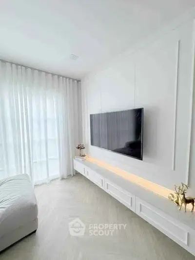 Modern living room with sleek TV setup and elegant decor