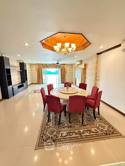 Spacious living room with elegant dining area and modern decor