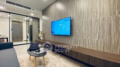 Modern living room with sleek TV setup and stylish decor