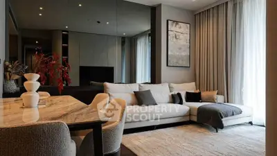 Elegant modern living room with stylish decor and cozy seating area.