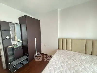 Modern bedroom with sleek wardrobe and stylish decor