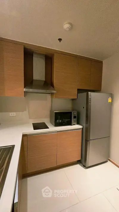 Modern kitchen with sleek cabinets and stainless steel appliances