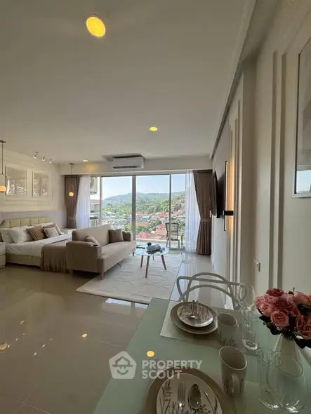 Luxurious open-plan living room with stunning view and elegant decor