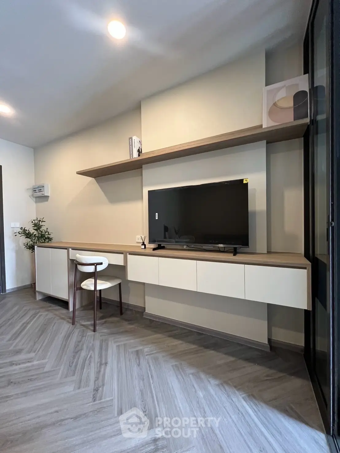 Modern living room with sleek TV unit and stylish decor
