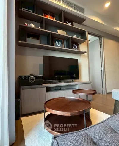 Modern living room with stylish wooden shelves and round coffee tables