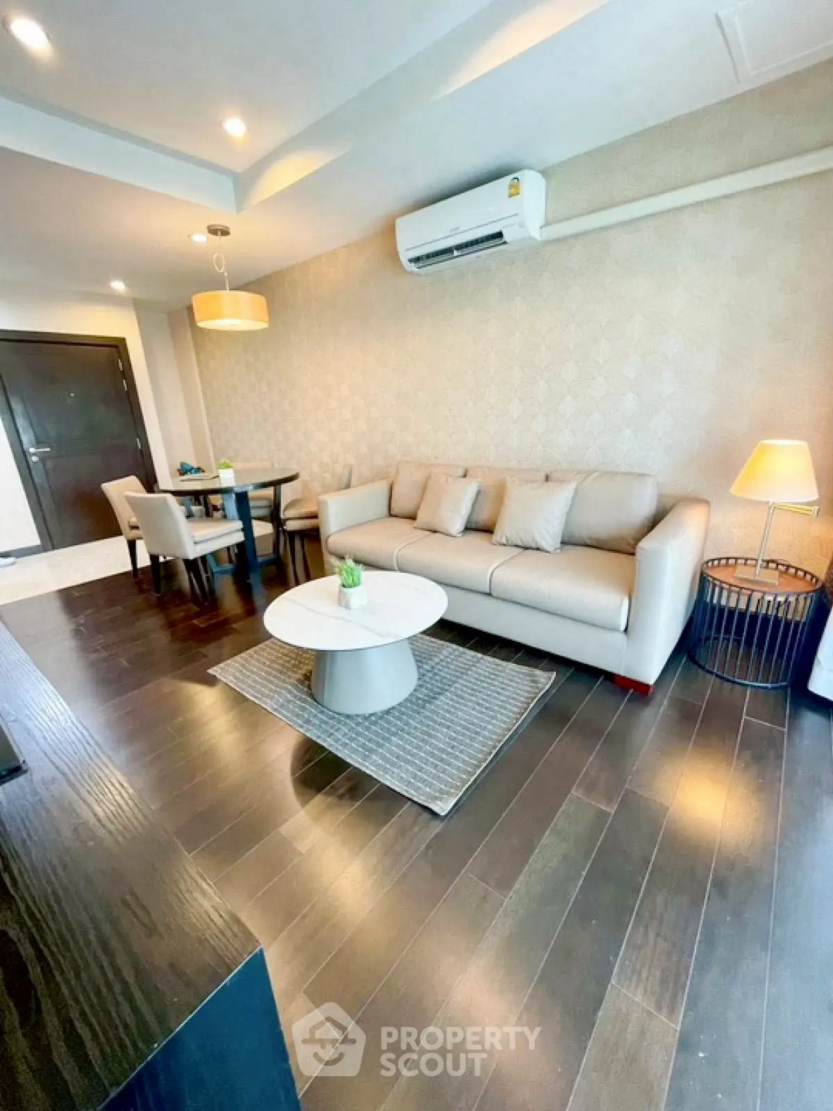 Modern living room with elegant decor and hardwood floors