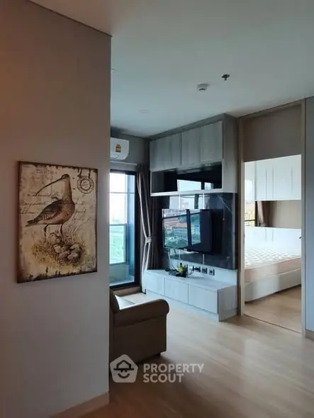 Modern living room with stylish decor and bedroom view