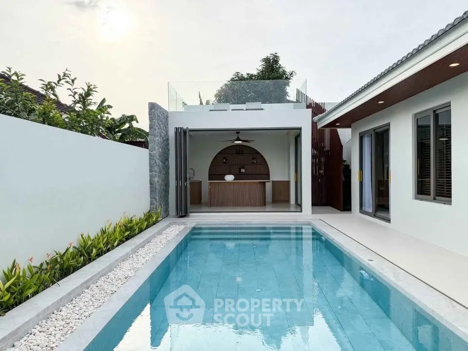 Modern villa with private pool and stylish outdoor area, perfect for luxury living.
