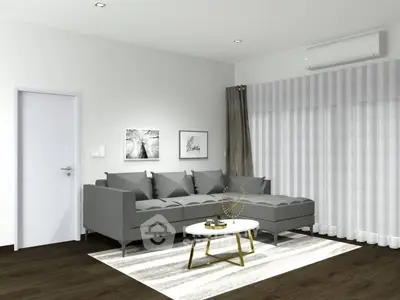 Modern living room with sleek gray sofa and stylish decor