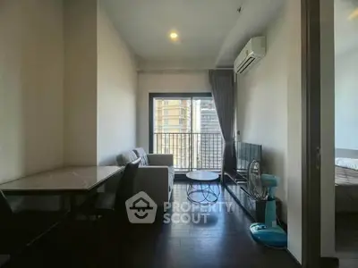 Modern living room with balcony view in urban apartment