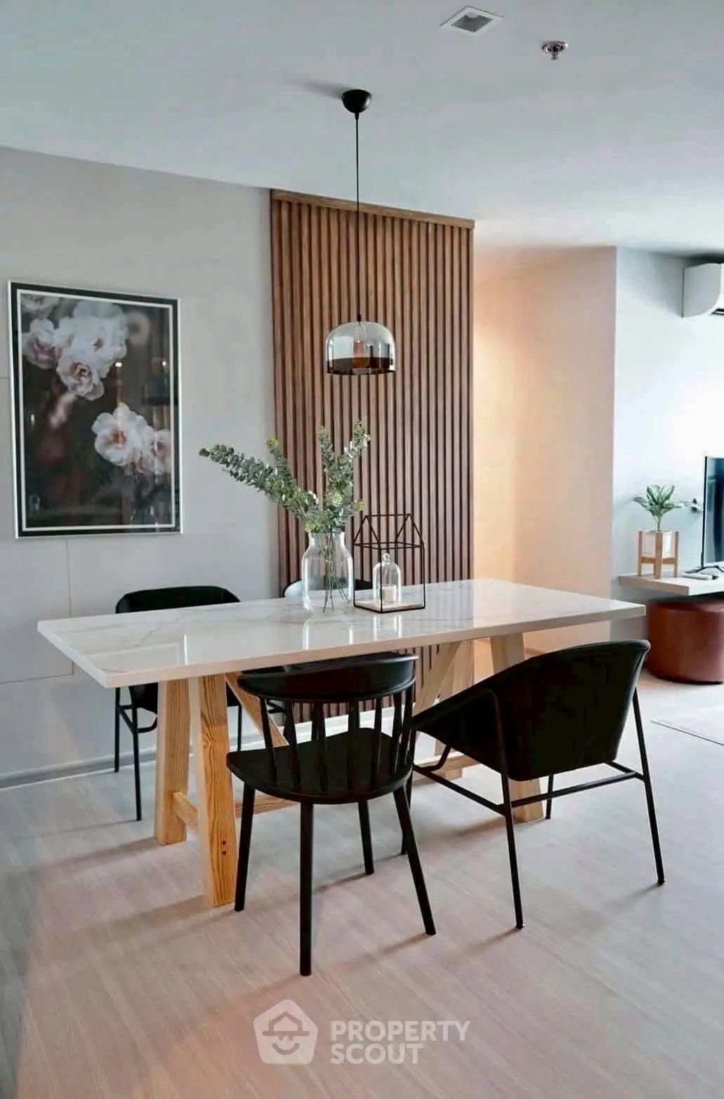Modern dining area with elegant decor and stylish furniture in a contemporary home.