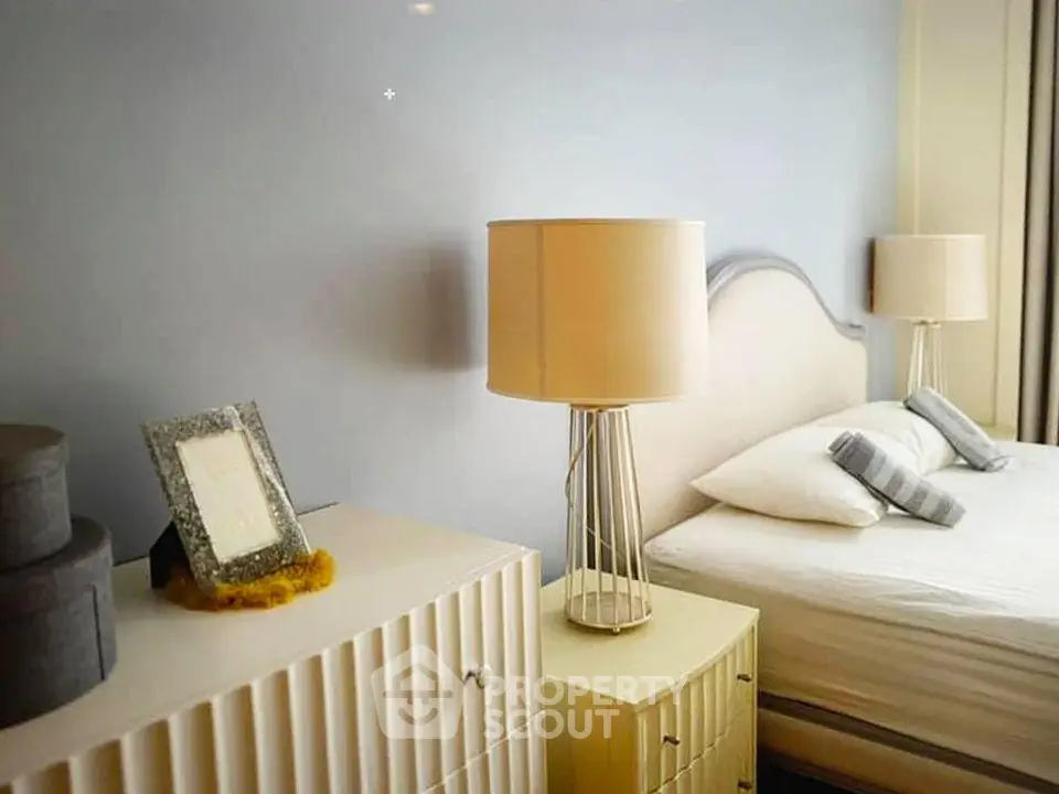 Elegant bedroom with modern decor and stylish lighting