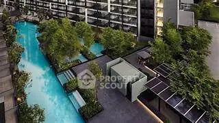 Luxurious condominium with stunning pool and lush greenery
