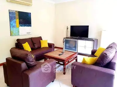 Cozy living room with modern furniture and vibrant decor accents