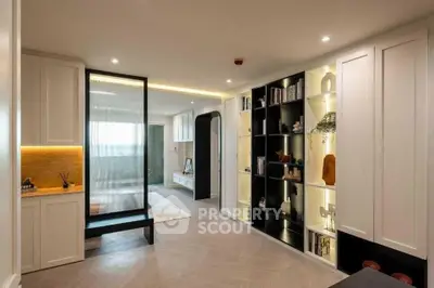 Modern living room with stylish shelving and cozy lighting