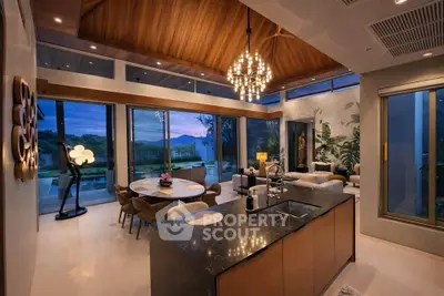 Luxurious open-plan living room with stunning evening view and elegant decor