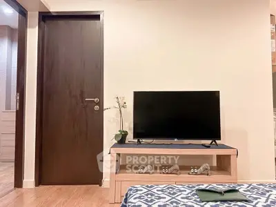 Modern living room with sleek TV setup and stylish decor