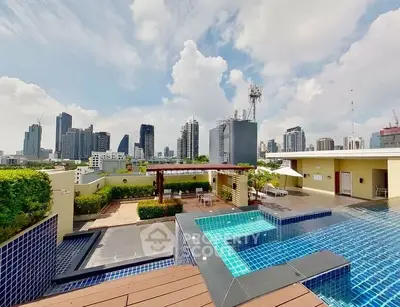 Stunning rooftop pool with city skyline views, perfect for urban living.