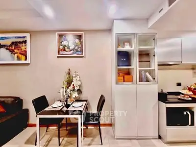 Modern dining area with elegant decor and sleek kitchen design
