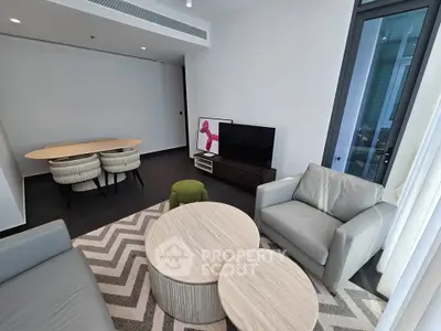 Modern living room with stylish furniture and natural light