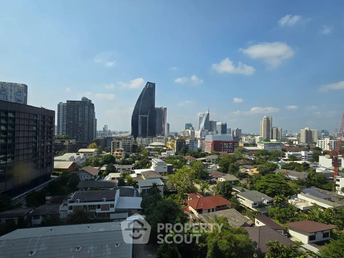 Stunning cityscape view showcasing modern skyscrapers and lush greenery, perfect for urban living enthusiasts.