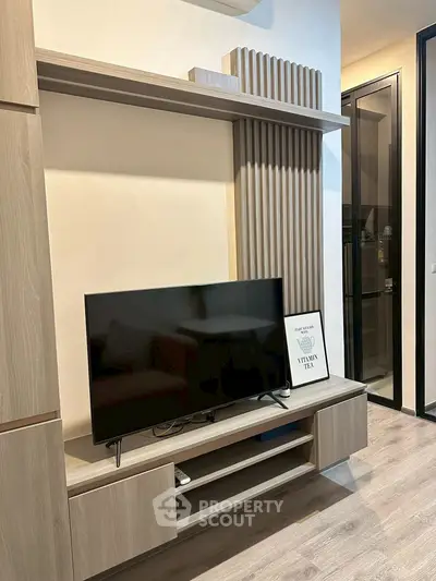 Modern living room with sleek TV stand and contemporary decor