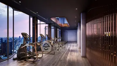 Luxurious high-rise gym with panoramic city views and modern fitness equipment.