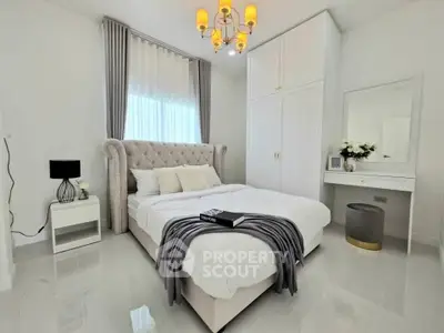 Luxurious bedroom with elegant decor and plush bedding