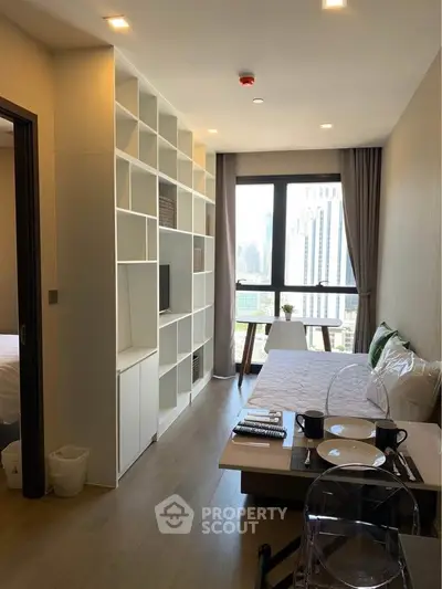 Modern studio apartment with city view and stylish interior design