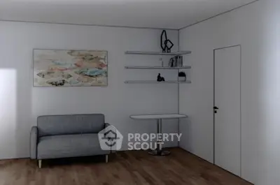 Modern minimalist living room with sleek furniture and wall art