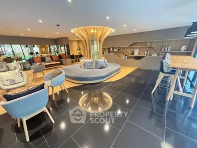 Luxurious modern living room with stylish furniture and unique central design feature