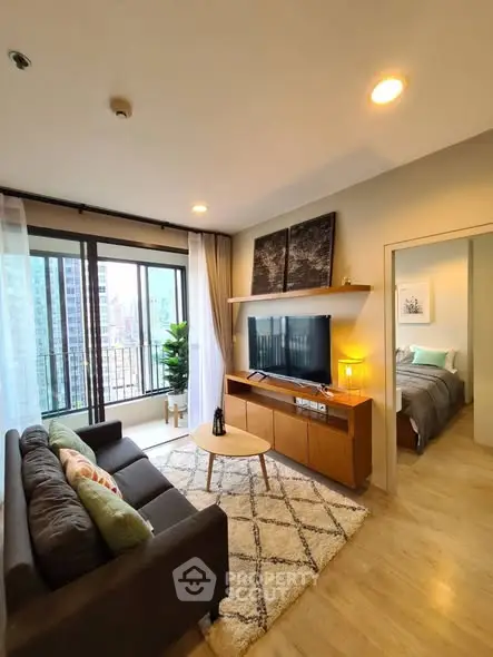 Modern living room with cozy decor and city view balcony