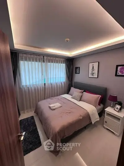 Cozy modern bedroom with ambient lighting and stylish decor