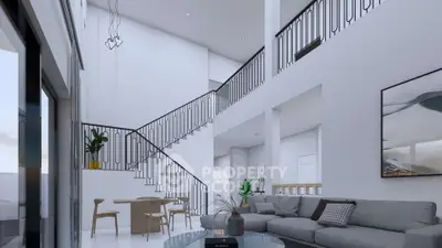 Stunning modern living room with high ceilings and elegant staircase