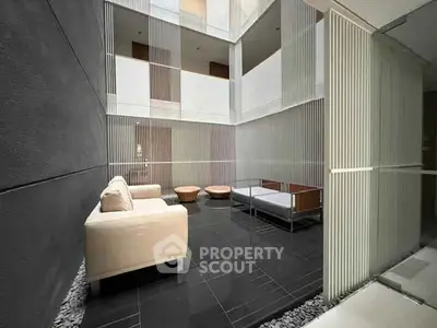 Modern interior courtyard with sleek design and comfortable seating