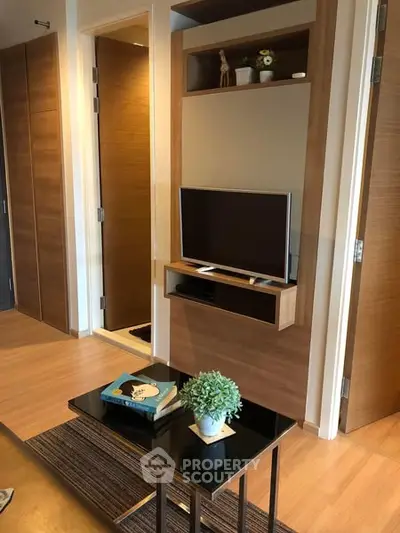 Modern living room with sleek TV setup and stylish decor