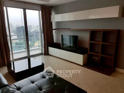 Modern living room with city view, sleek furniture, and large windows in a high-rise apartment.