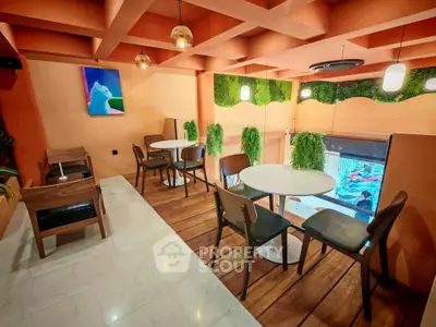 Chic modern dining area with stylish decor and vibrant lighting