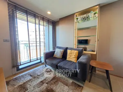 Modern living room with cozy sofa and large window view