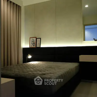 Modern bedroom with ambient lighting and sleek design