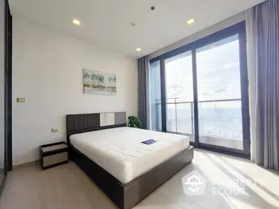 Modern bedroom with large windows and city view, featuring minimalist design and natural light.