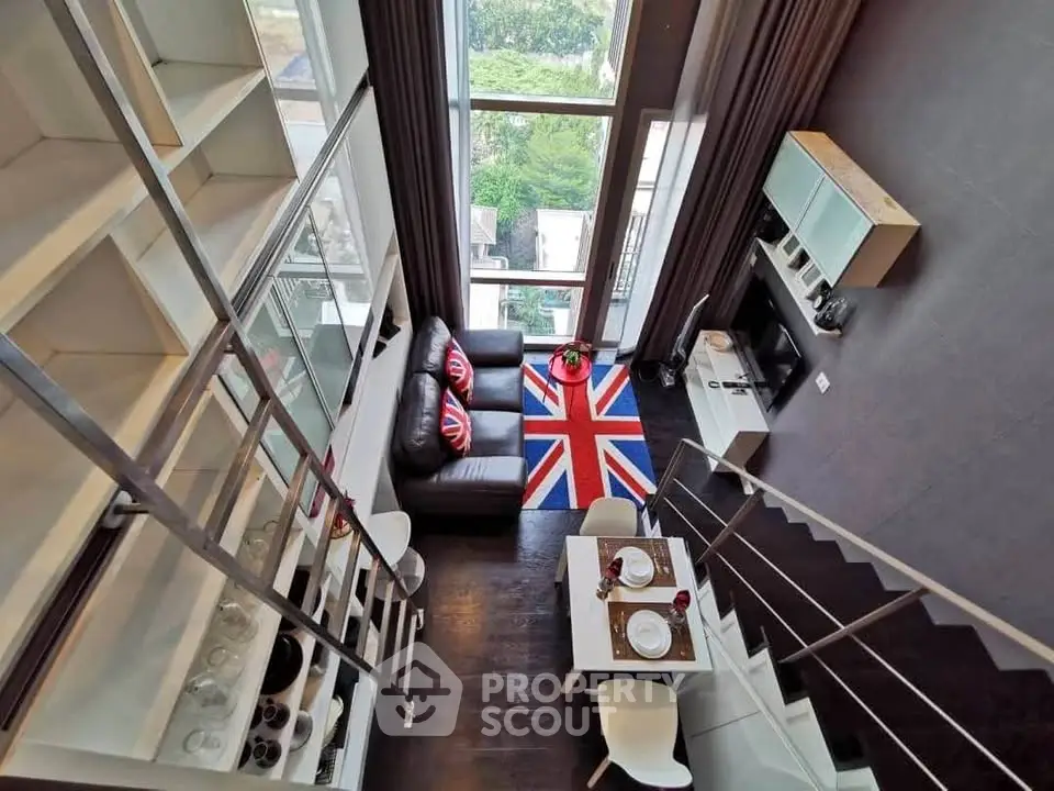 Modern loft apartment with high ceilings and stylish decor