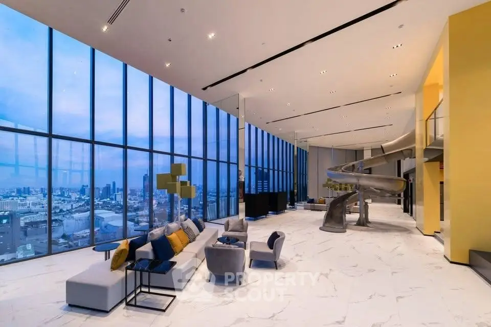 Luxurious modern living room with panoramic city views and unique slide feature.