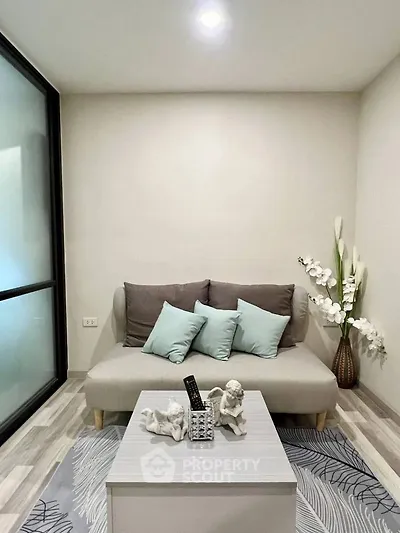 Cozy living room with modern decor and soft lighting, perfect for relaxation.
