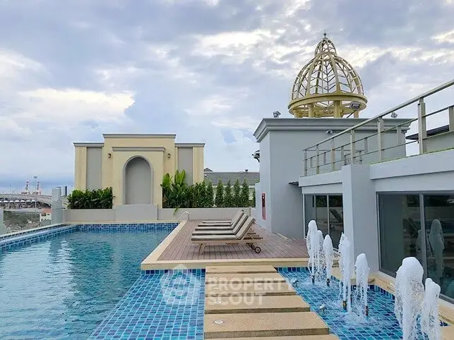 Luxurious rooftop pool with elegant architecture and stunning city views.