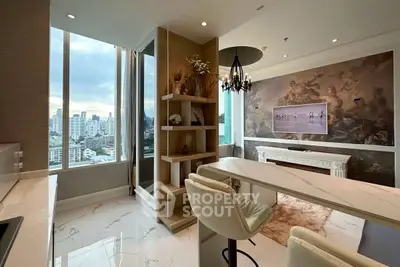 Luxurious modern kitchen with panoramic city view and elegant decor.